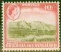 Valuable Postage Stamp from Rhodesia & Nyasaland 1959 10s Olive-Brown & Rose-Red SG30 V.F Very Lightly Mtd